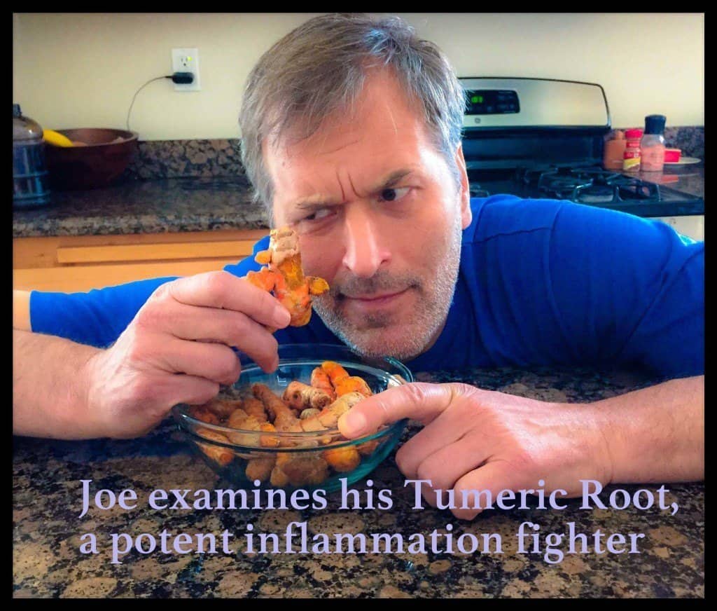 Joe examines his tumeric root
